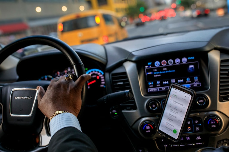 Driver at the wheel of a car.