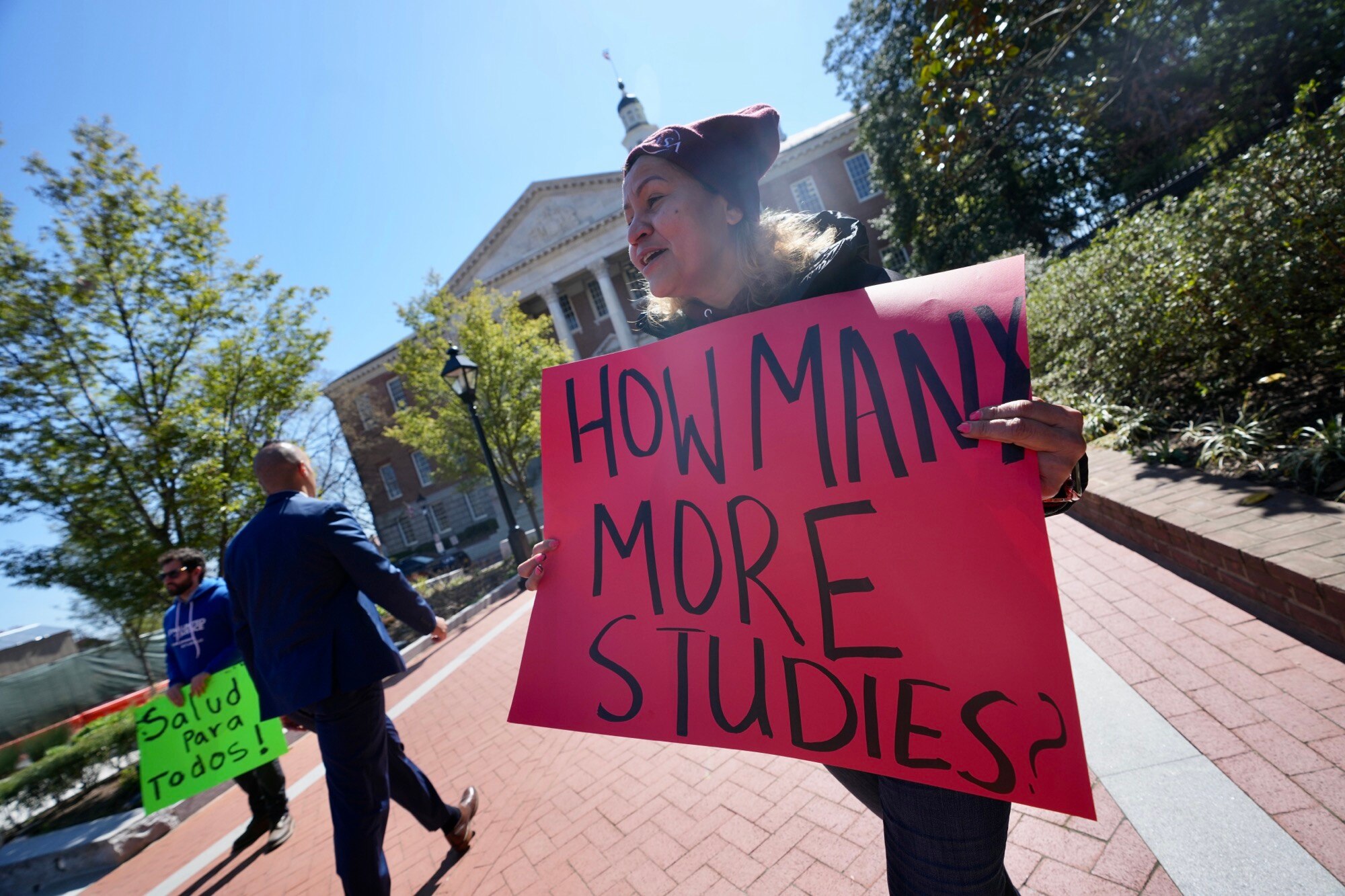 Ana Rodriguez, organizer with CASA, protests outside of the Maryland State House for free healthcare on the last day of the legislative session on April 10, 2023.