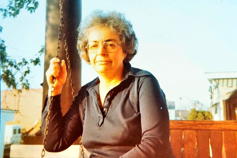 Ruth Meeron on porch of her Waverly home, early 1980s.