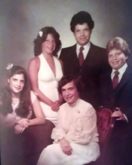 Paula Hollinger, seated, with her daughters Ilene and Marcy, her husband Paul and son David.