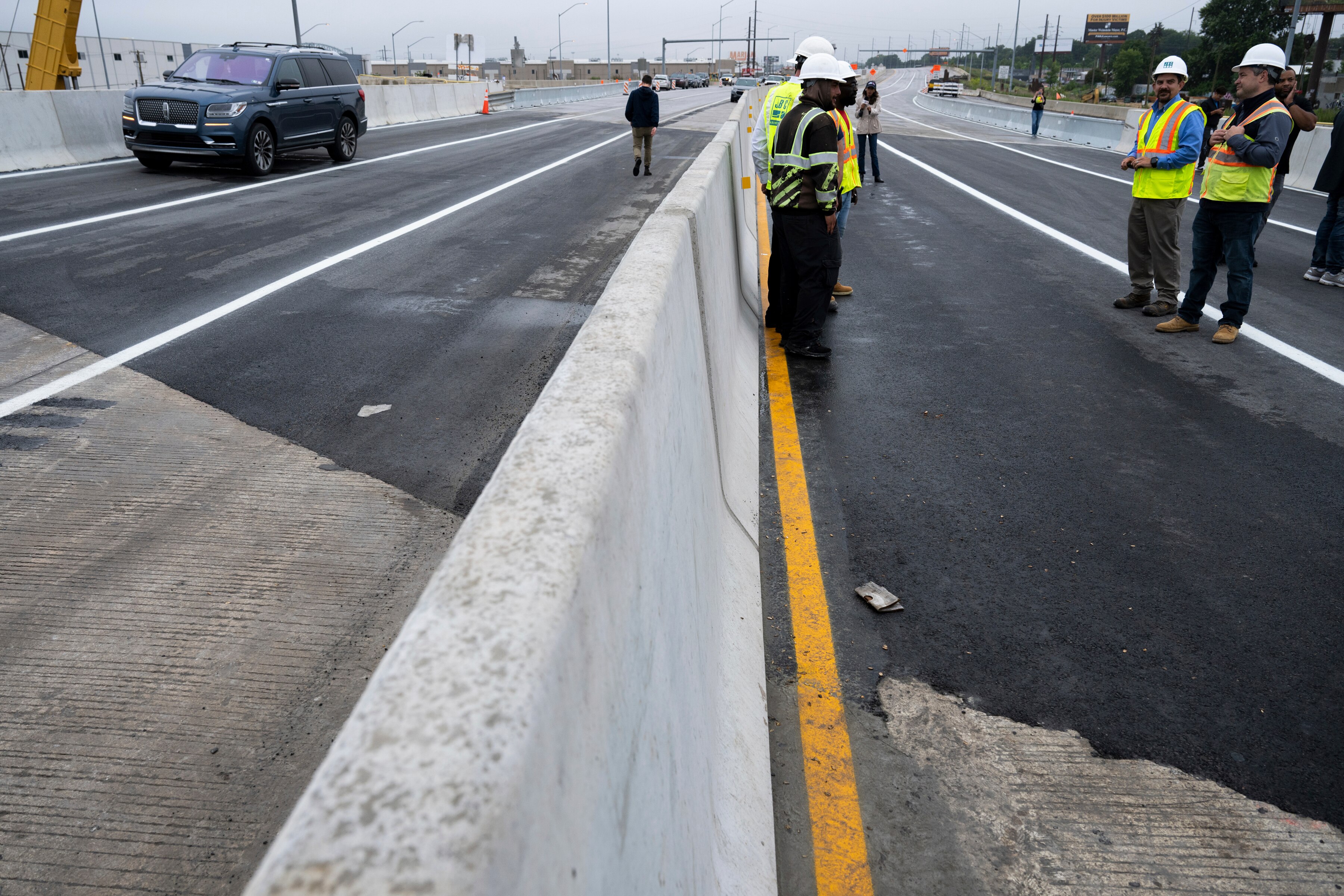 A repaired section of Interstate 95 is finished ahead of schedule as a news conference is held to announce the highway’s reopening Friday, June 23, 2023 in Philadelphia. Workers put the finishing touches on an interim six-lane roadway that will serve motorists during construction of a permanent bridge.