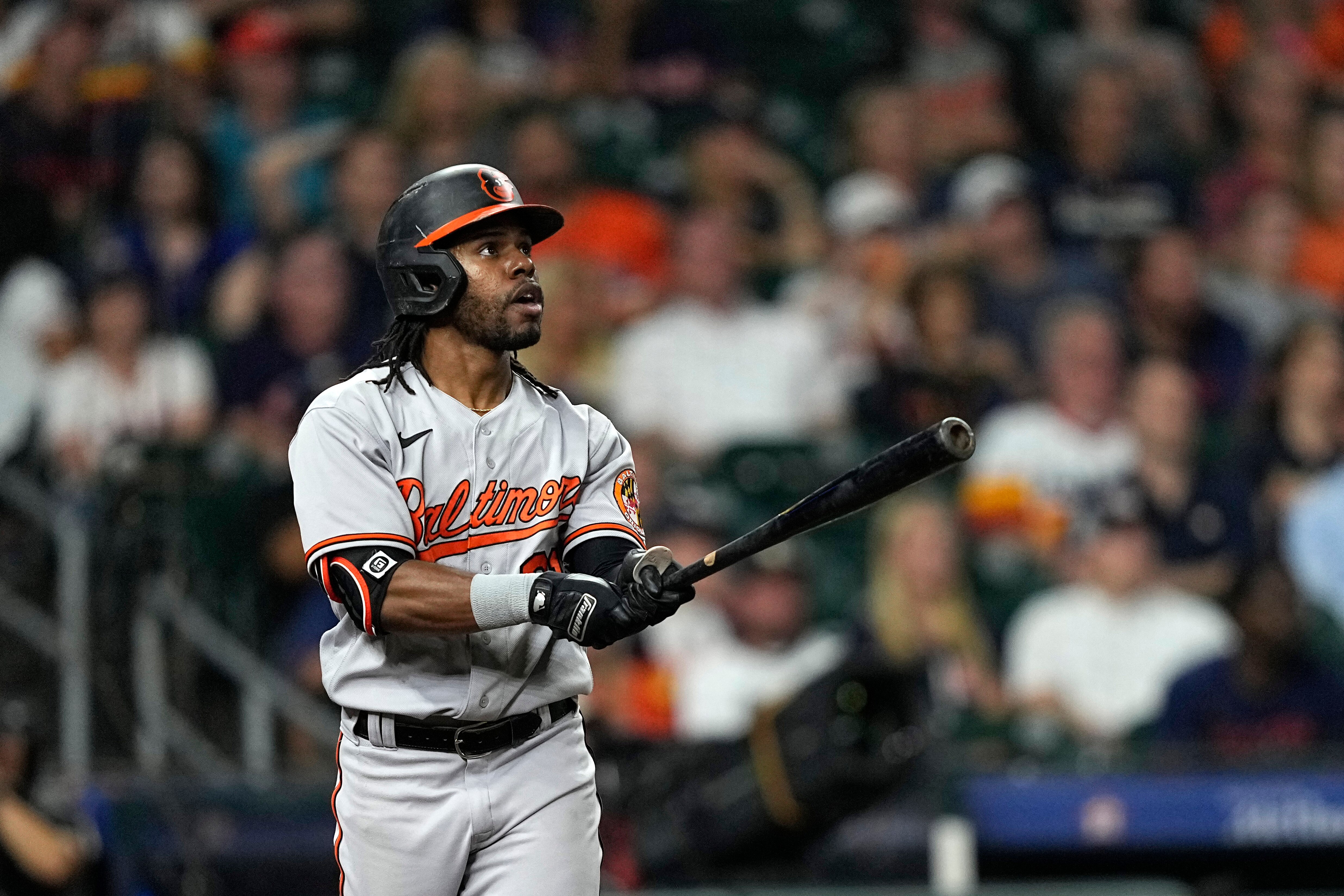 Baltimore Orioles’ Cedric Mullins watches his three-run home run against the Houston Astros during the ninth inning of a baseball game Monday, Sept. 18, 2023, in Houston.