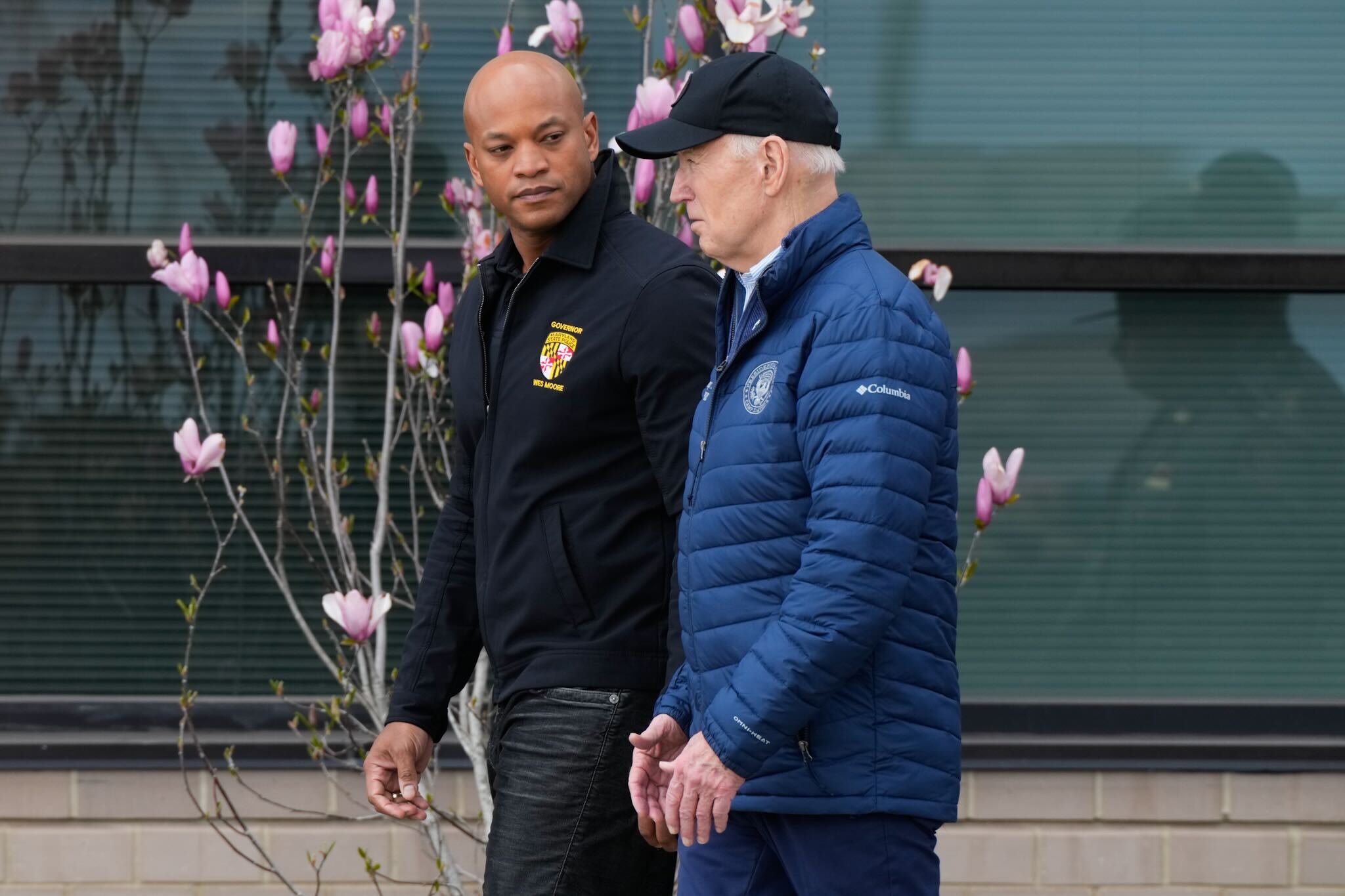 Maryland Gov. Wes Moore talks with President Joe Biden in April near the site of the Key Bridge collapse in Dundalk.