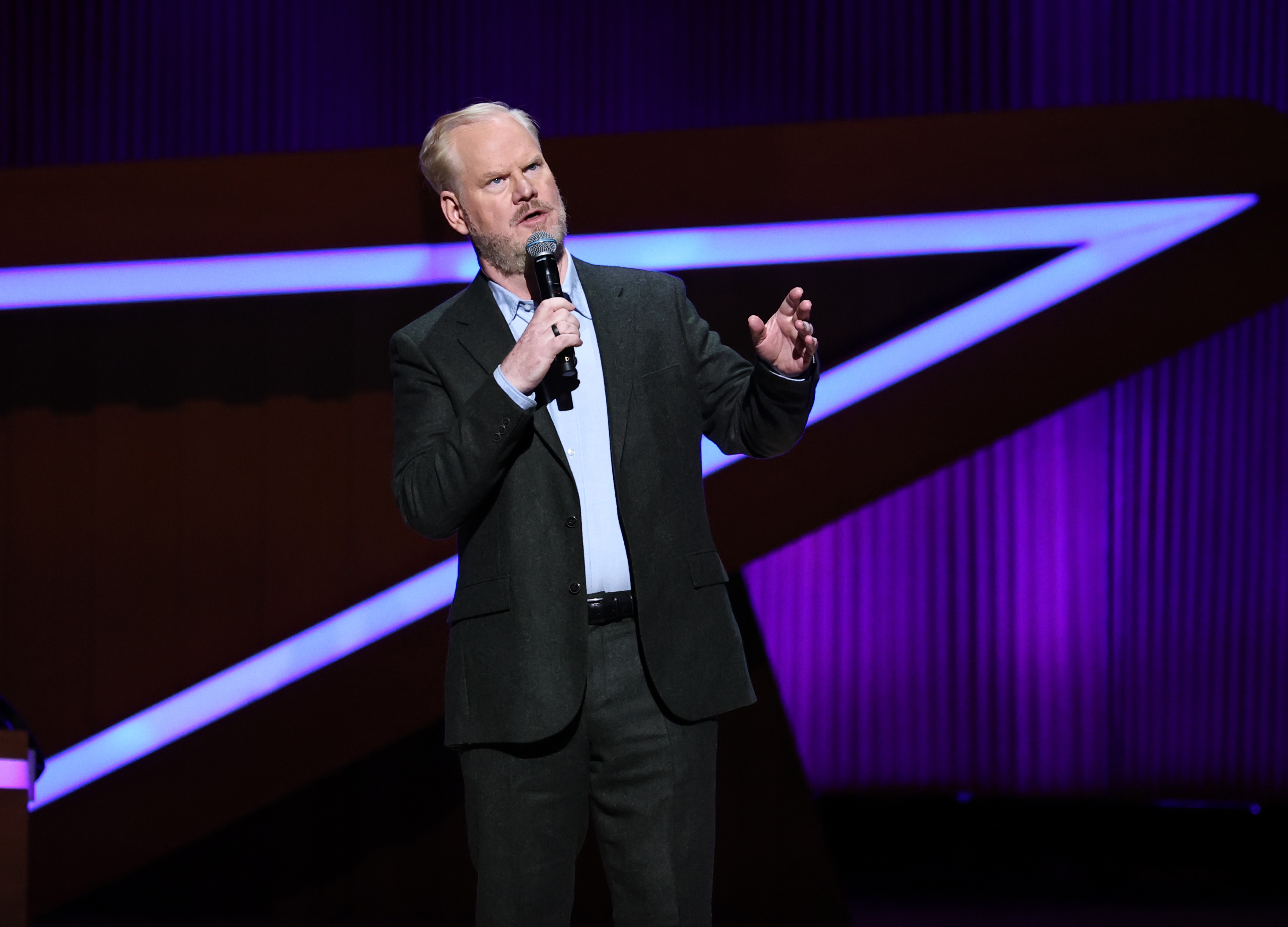 NEW YORK, NEW YORK - NOVEMBER 10: Jim Gaffigan speaks onstage during the 19th Annual Stand Up For Heroes Benefit Presented By Bob Woodruff Foundation And New York Comedy Festival at David Geffen Hall on November 10, 2025 in New York City. (Photo by Jamie McCarthy/Getty Images for Bob Woodruff Foundation)