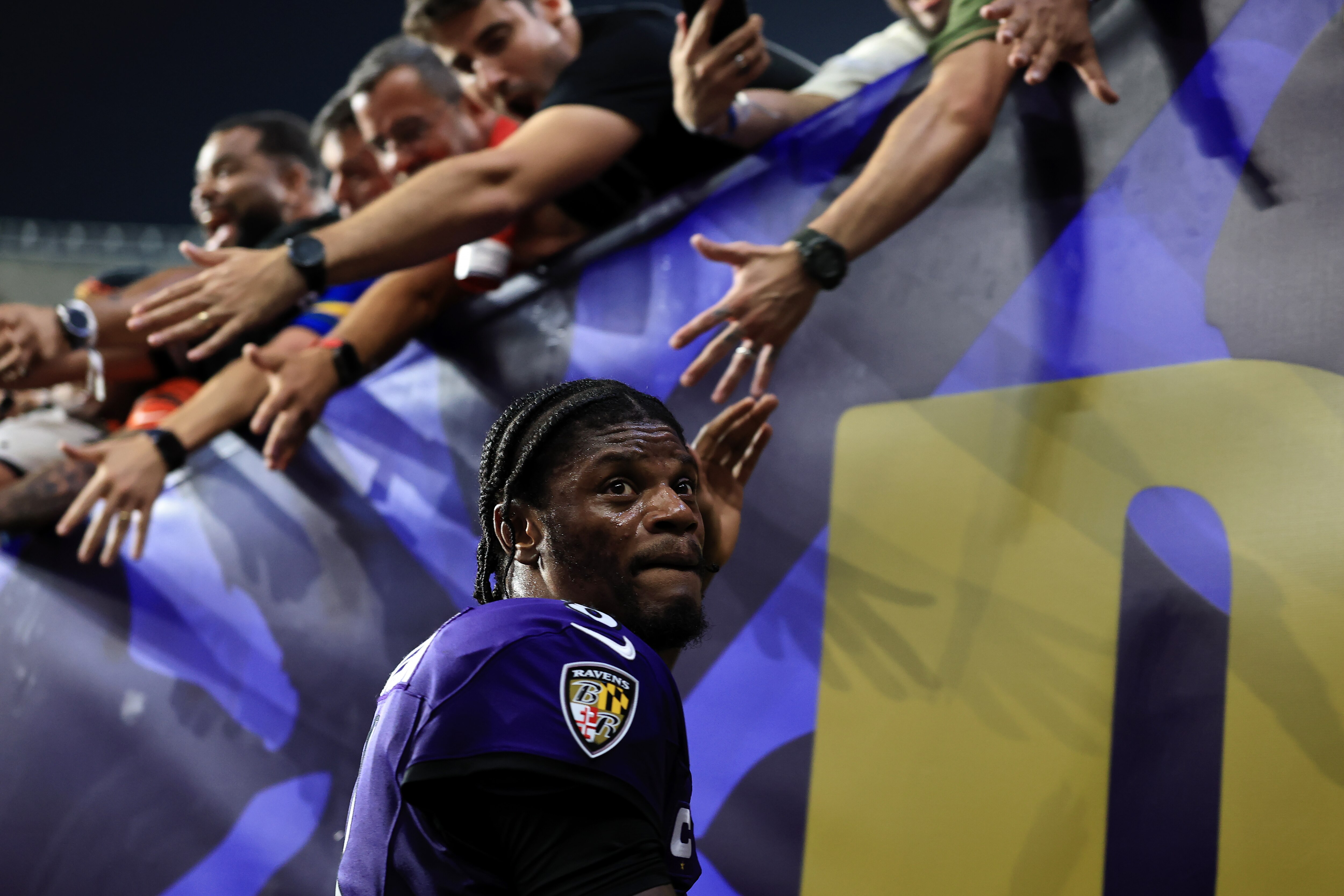 Lamar Jackson greets fans after the Ravens beat the Cowboys in the NFL’s first-ever game in Rio de Janeiro. 