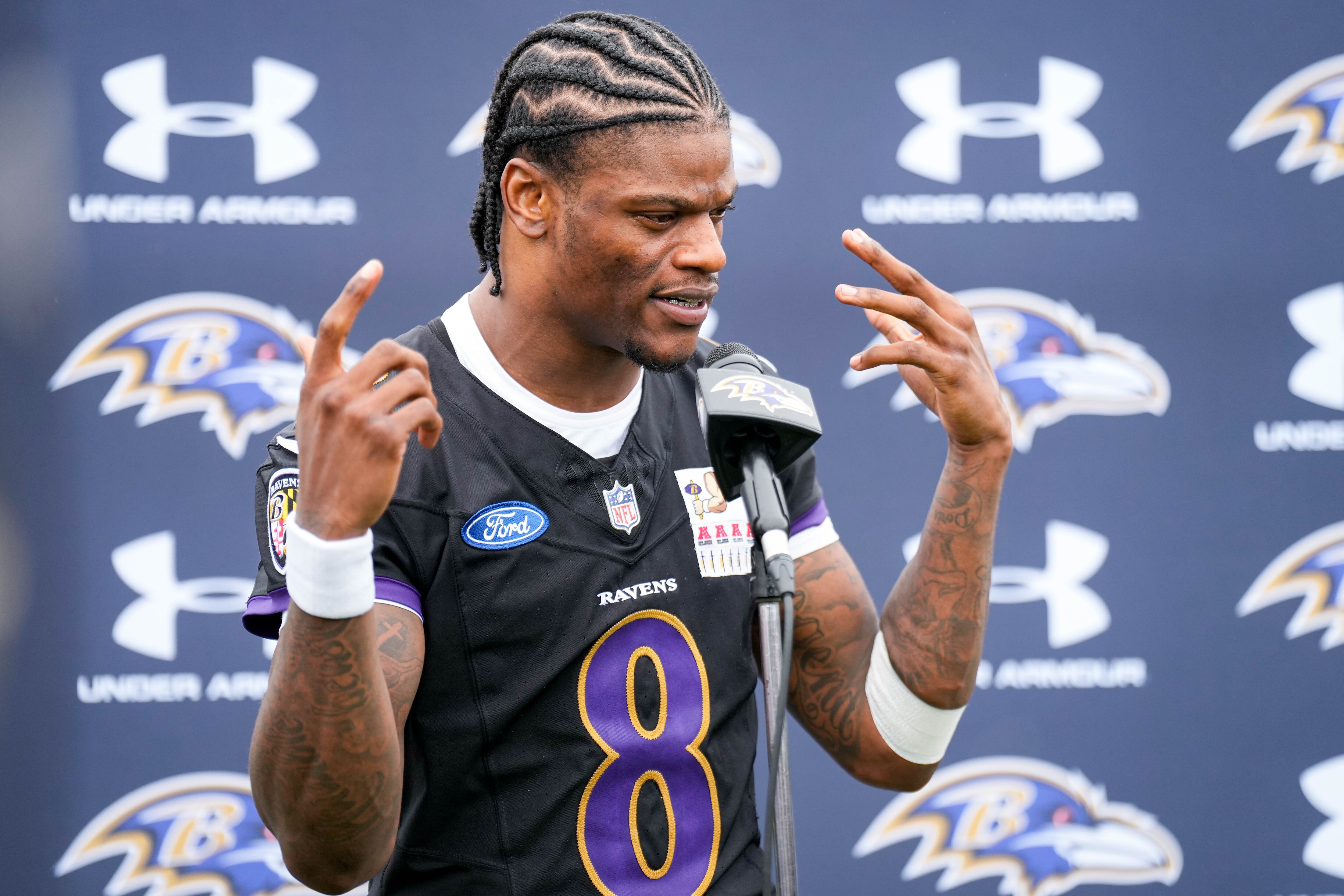 Quarterback Lamar Jackson takes questions from reporters following the team’s mandatory minicamp Tuesday.