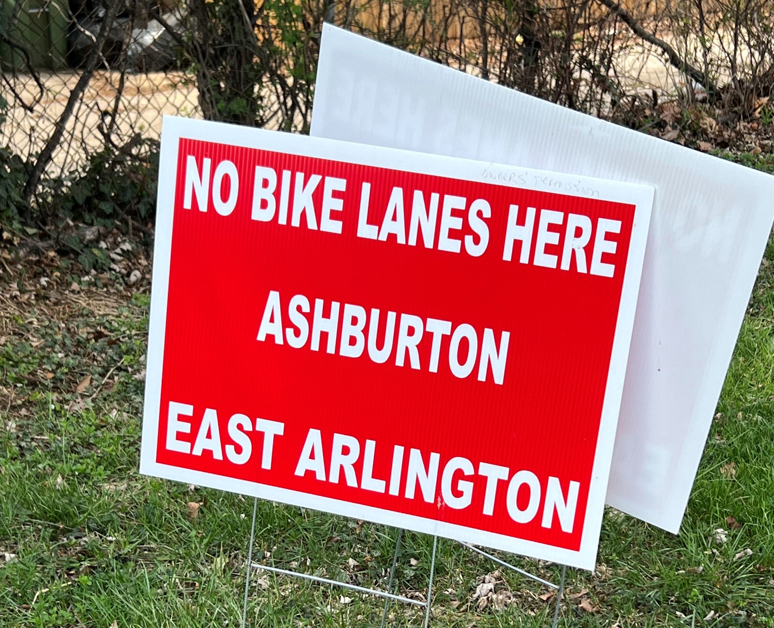 Residents put up signs in Ashburton, East Arlington and Gwynns Falls Parkway to oppose a city project that would extend existing Baltimore trails.