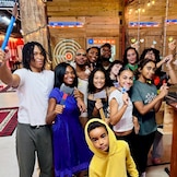 Ax & Smash axe-throwing and splatter glow paint party