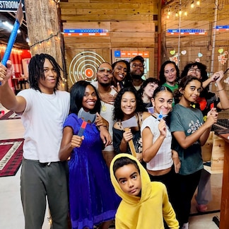 Ax & Smash axe-throwing and splatter glow paint party