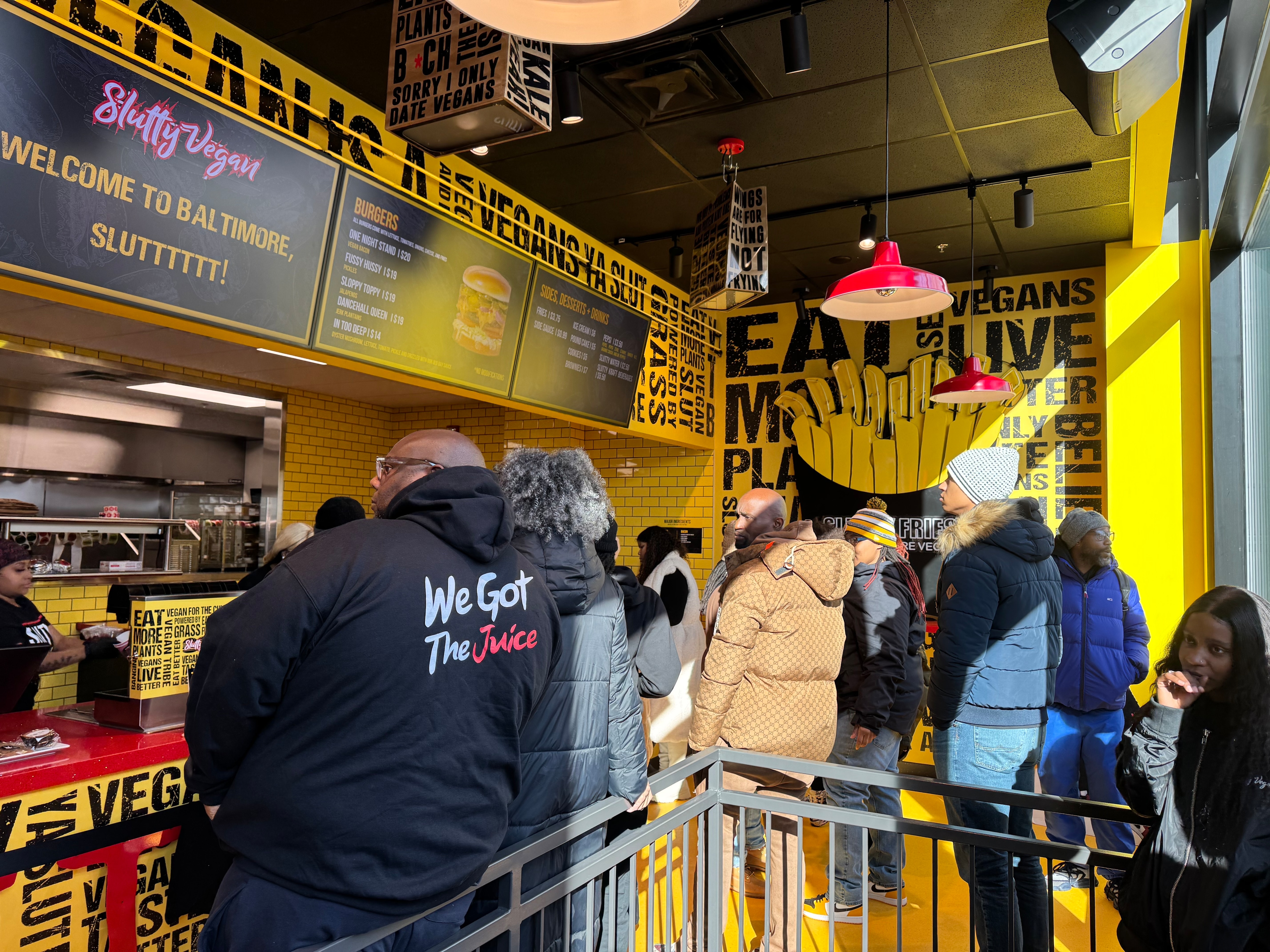 Customers lined up inside after waiting for hours in the cold.