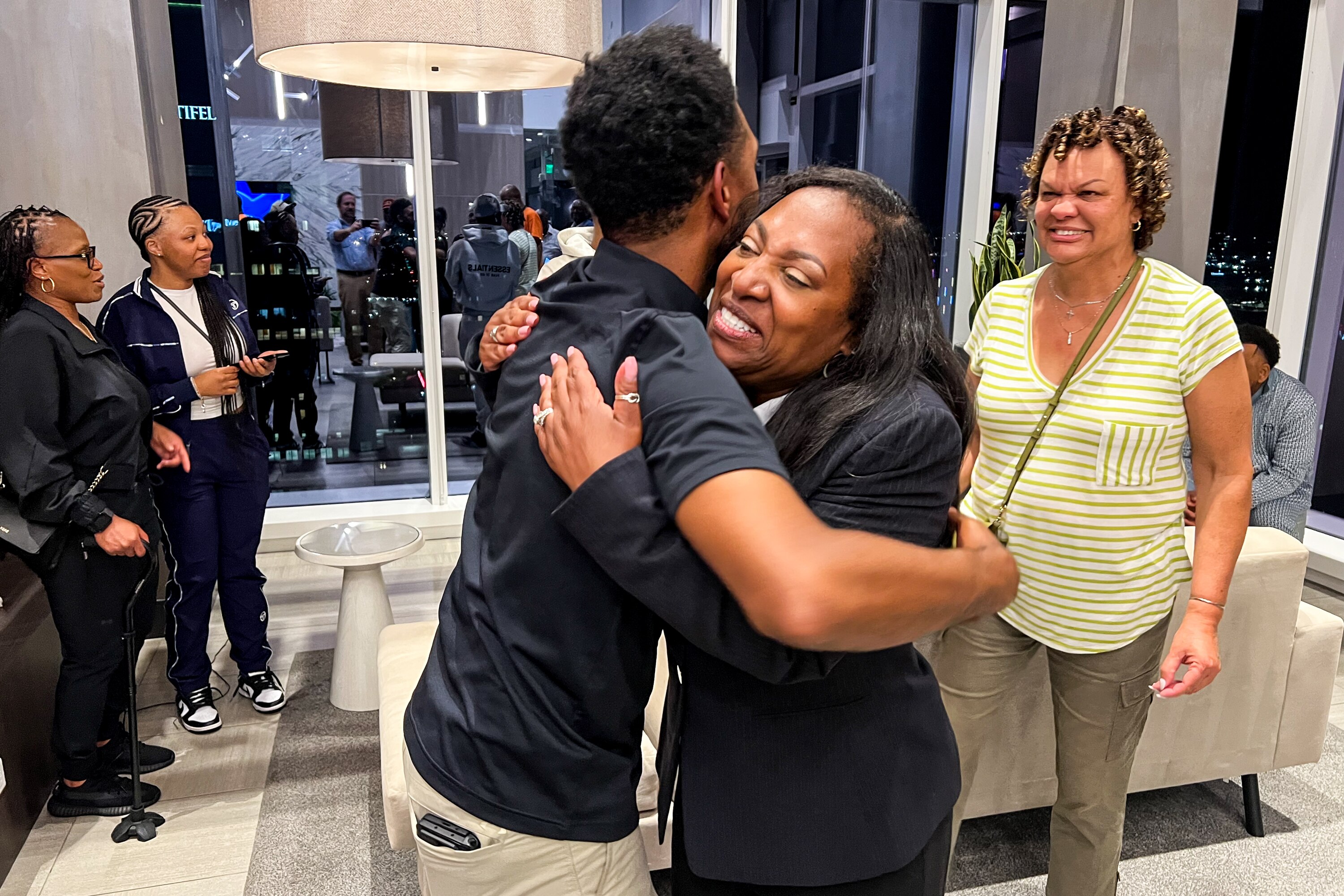 Baltimore Mayor Brandon Scott hugs Sabrina Tapp-Harper at her primary election night watch party in Baltimore on Tuesday evening.