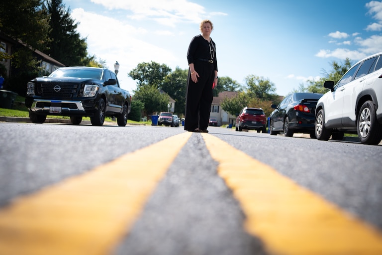 SEPTEMBER 9, 2026: Katie Nash, Frederick City Council Vice President, is pictured on Stoneybrook Ct. where ICE agents staked out a neighborhood in Frederick, MD for nearly two days. Nash was present during the events and is standing where the protestors were sitting in the street. (Photo by Sarah L. Voisin For The Banner)