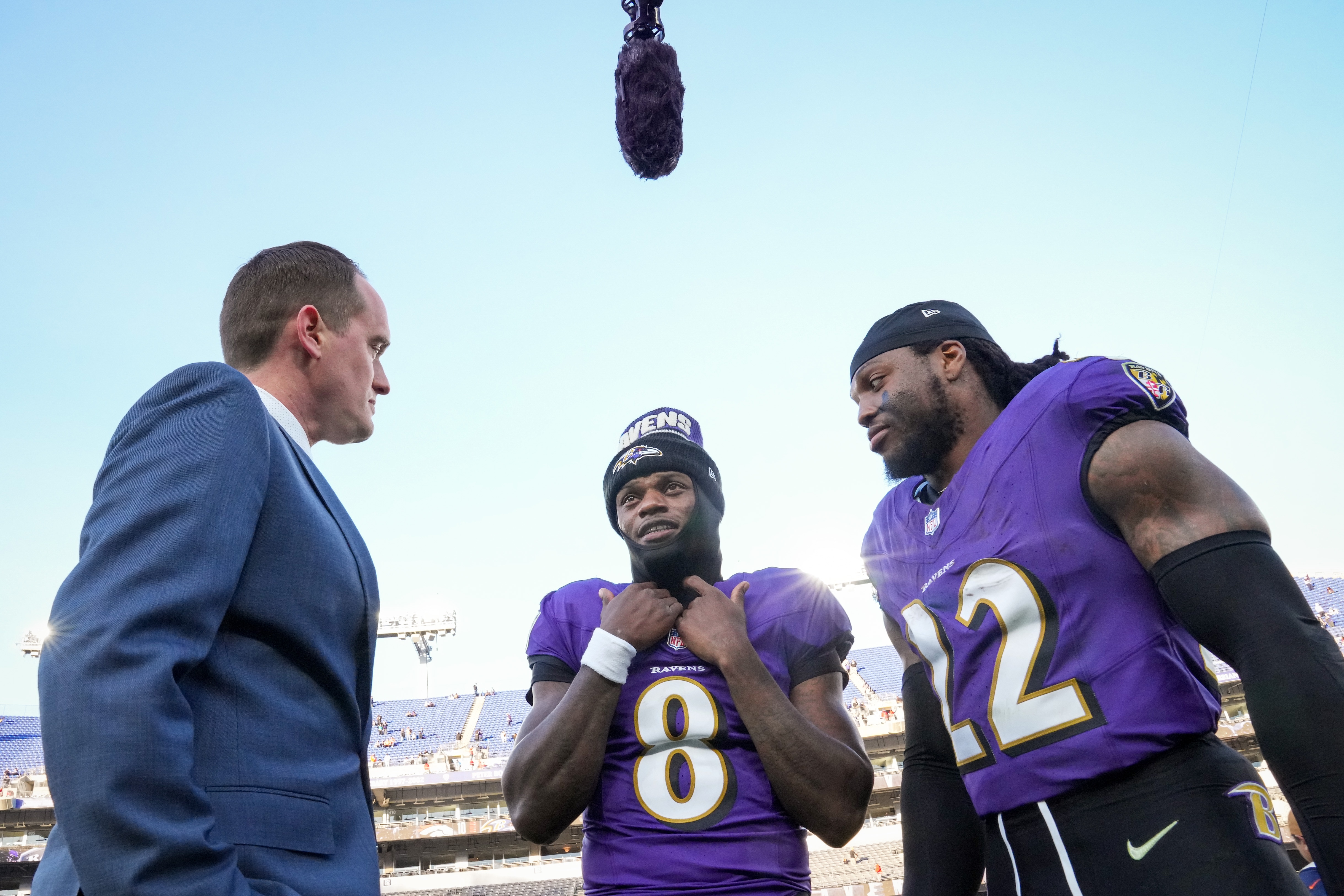 Baltimore Ravens running back Derrick Henry (22) and quarterback Lamar Jackson (8) are interviewed together after beating the Denver Broncos at M&T Bank Stadium.