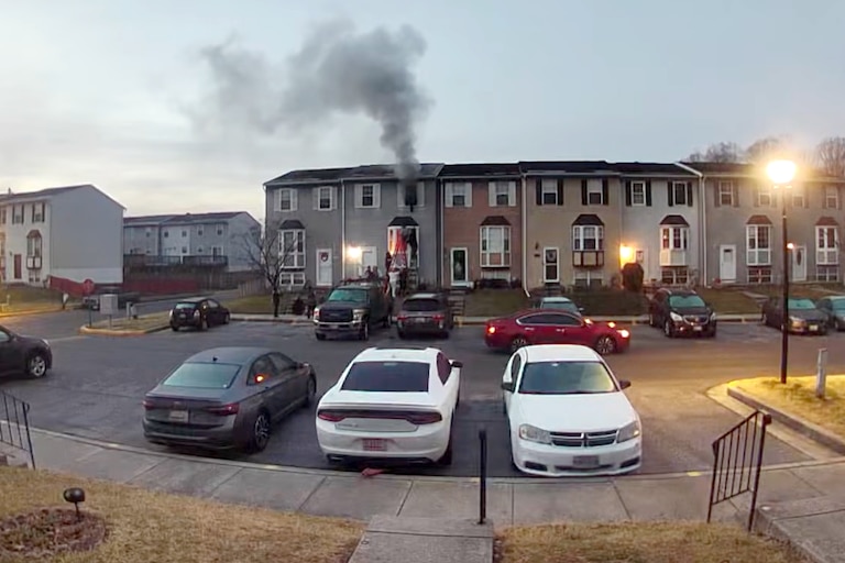 A still from Ring camera footage shows a Middle River rescue of a family from a house fire on January 6, 2026.