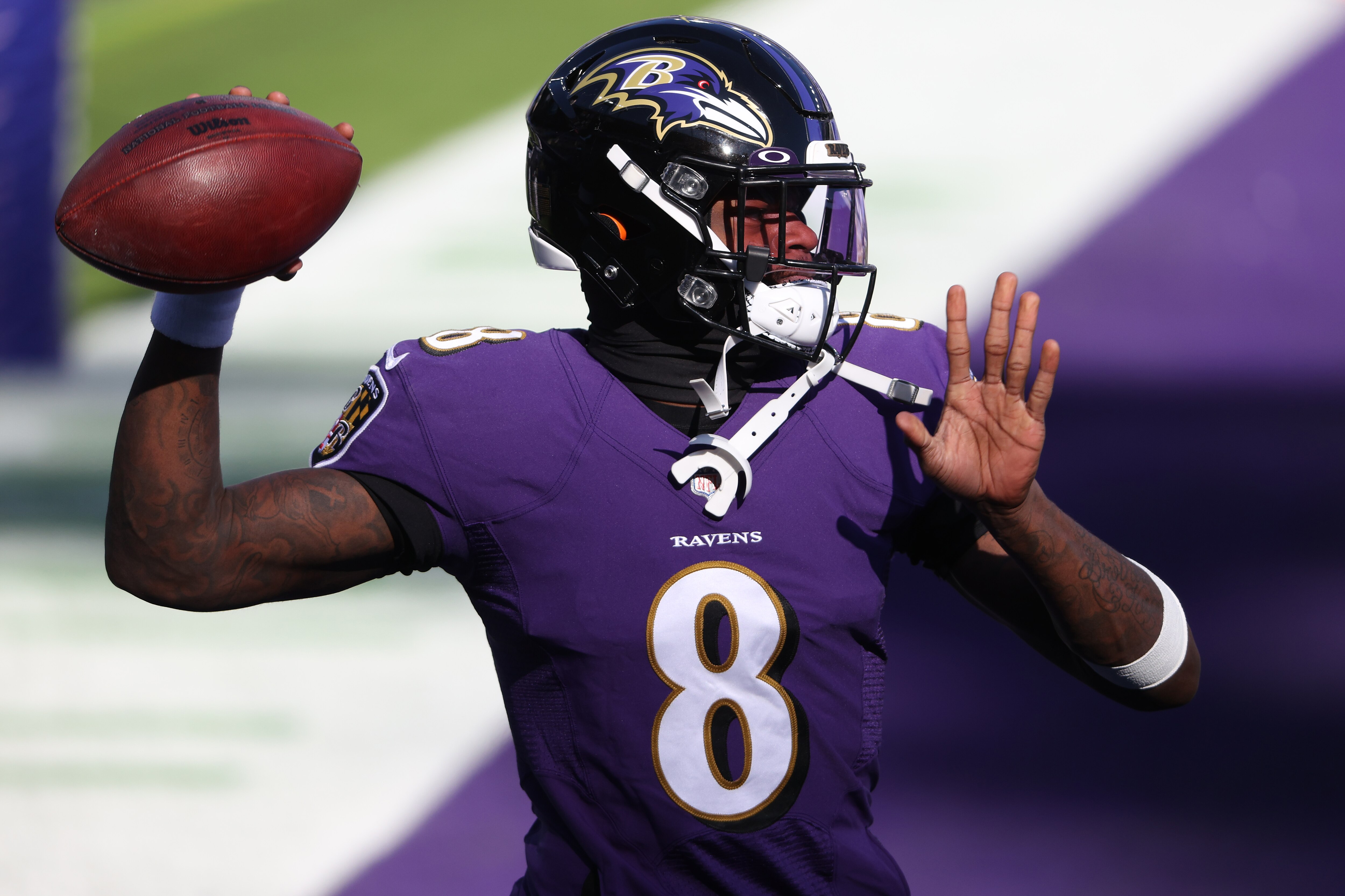 BALTIMORE, MARYLAND - DECEMBER 27: Quarterback Lamar Jackson #8 of the Baltimore Ravens in action against the New York Giants at M&T Bank Stadium on December 27, 2020 in Baltimore, Maryland.