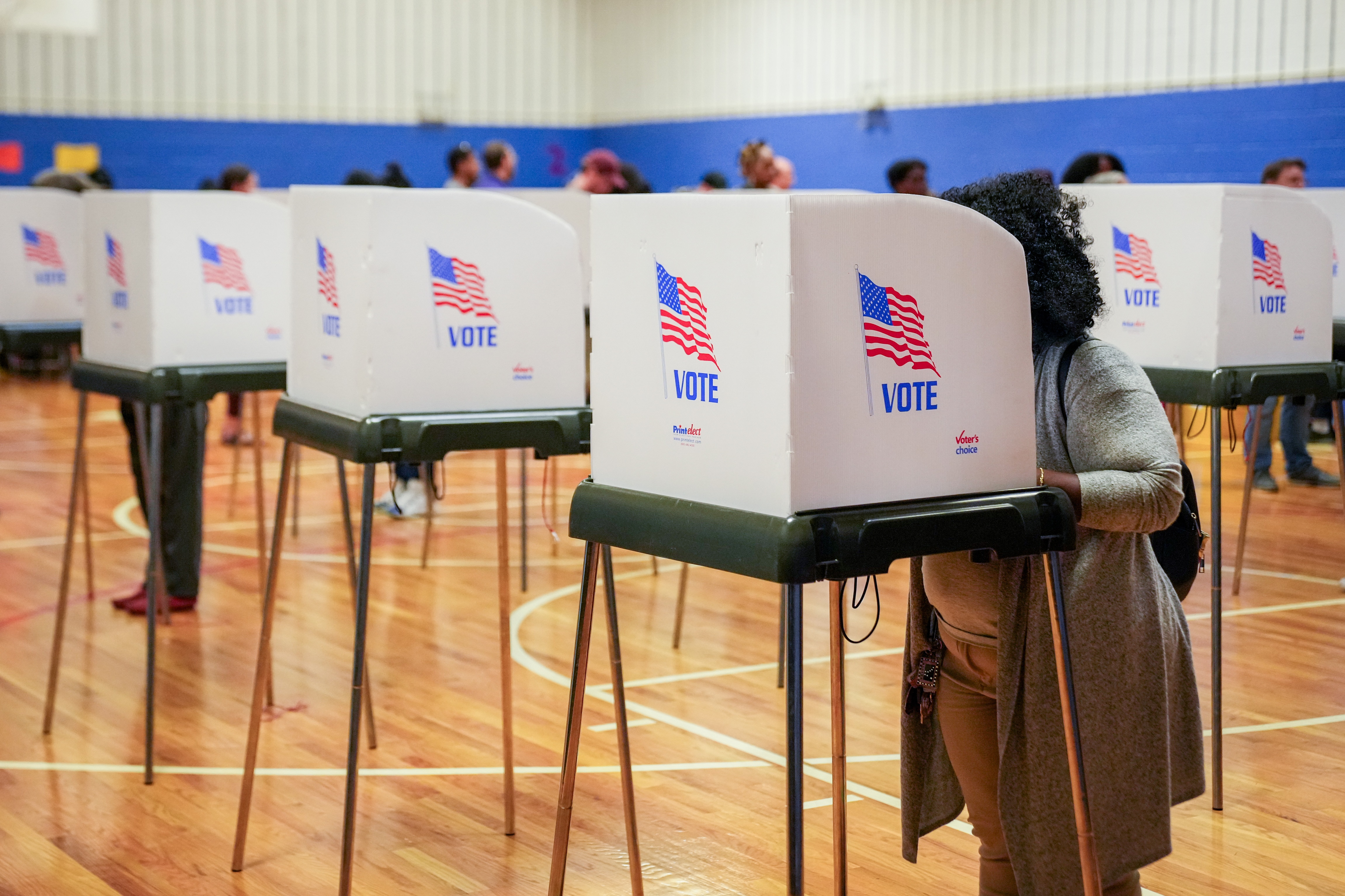 Baltimore residents cast their votes inside the polling location at Margaret Brent Elementary/Middle School on Tuesday.