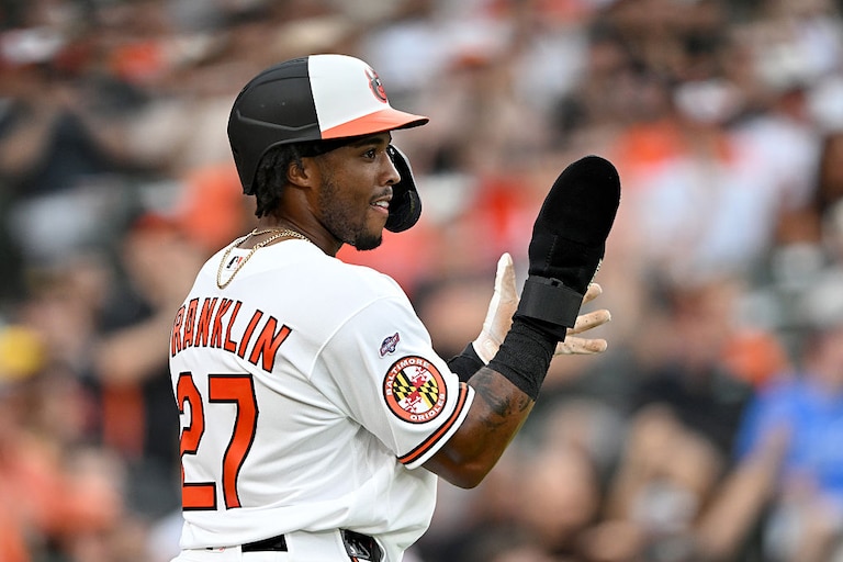 Orioles outfielder Christian Franklin celebrates after scoring in the third inning of his major league debut against the Los Angeles Angels on Aug. 4.