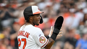 Orioles outfielder Christian Franklin celebrates after scoring in the third inning of his major league debut against the Los Angeles Angels on Aug. 4.