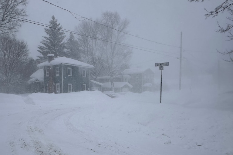 Strong winds kick up snow in Lowville, New York, on Friday, Jan. 23, 2026. (AP Photo/Cara Anna)