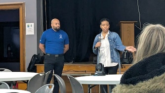 Monday, March 30, 2026 - Cristiano Quijano, an energy assistance and community engagement manager for BGE, and Lineta Duren, a community engagement manager for BGE, speak at a meeting with the Riverside Neighborhood Association at Salem Lutheran Church in Baltimore.