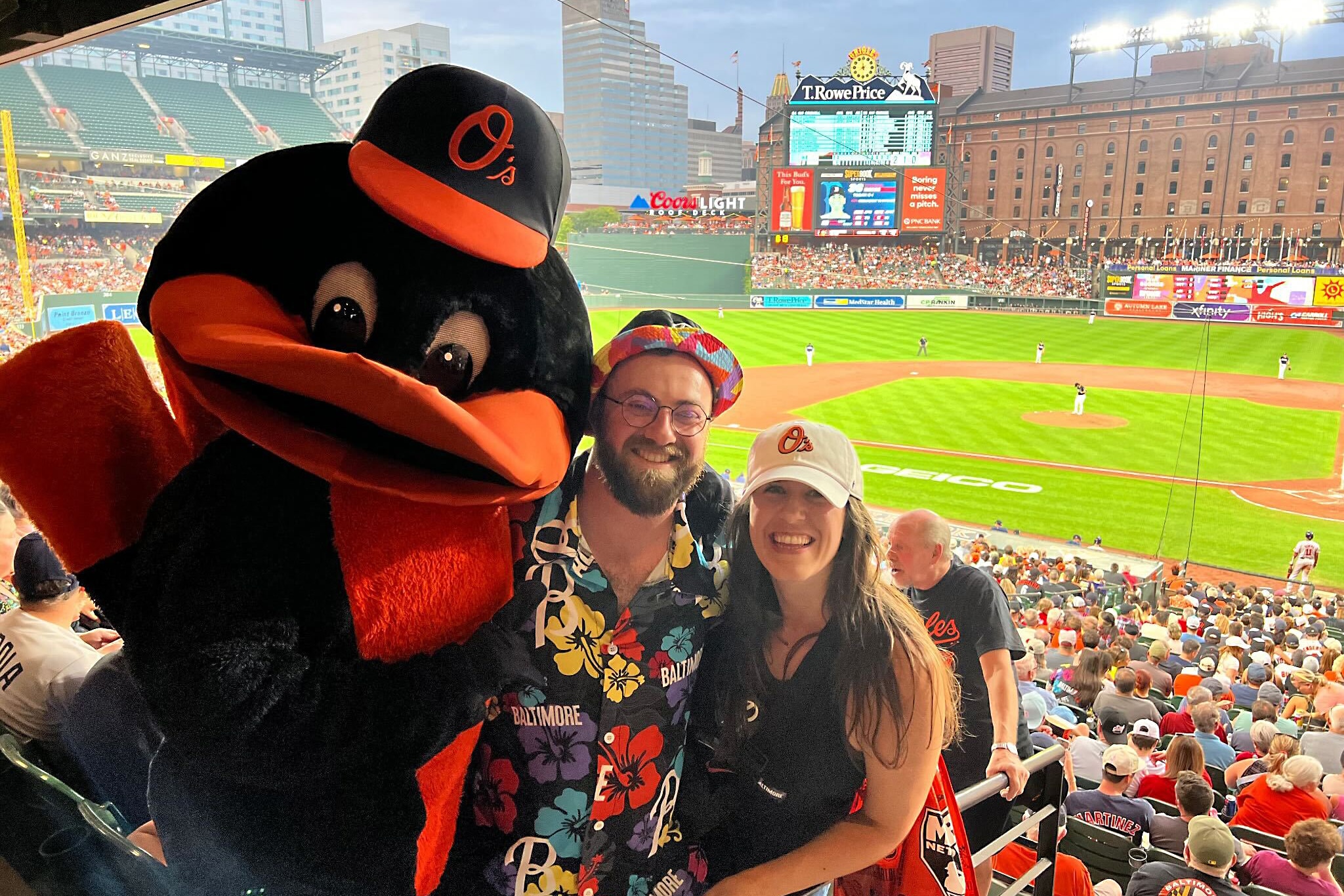 Jake Gardner and his wife, Bethany Boucher, with the Oriole Bird at a game. Gardner was disappointed to learn he was getting kicked out of his row 2 seats in section 47.