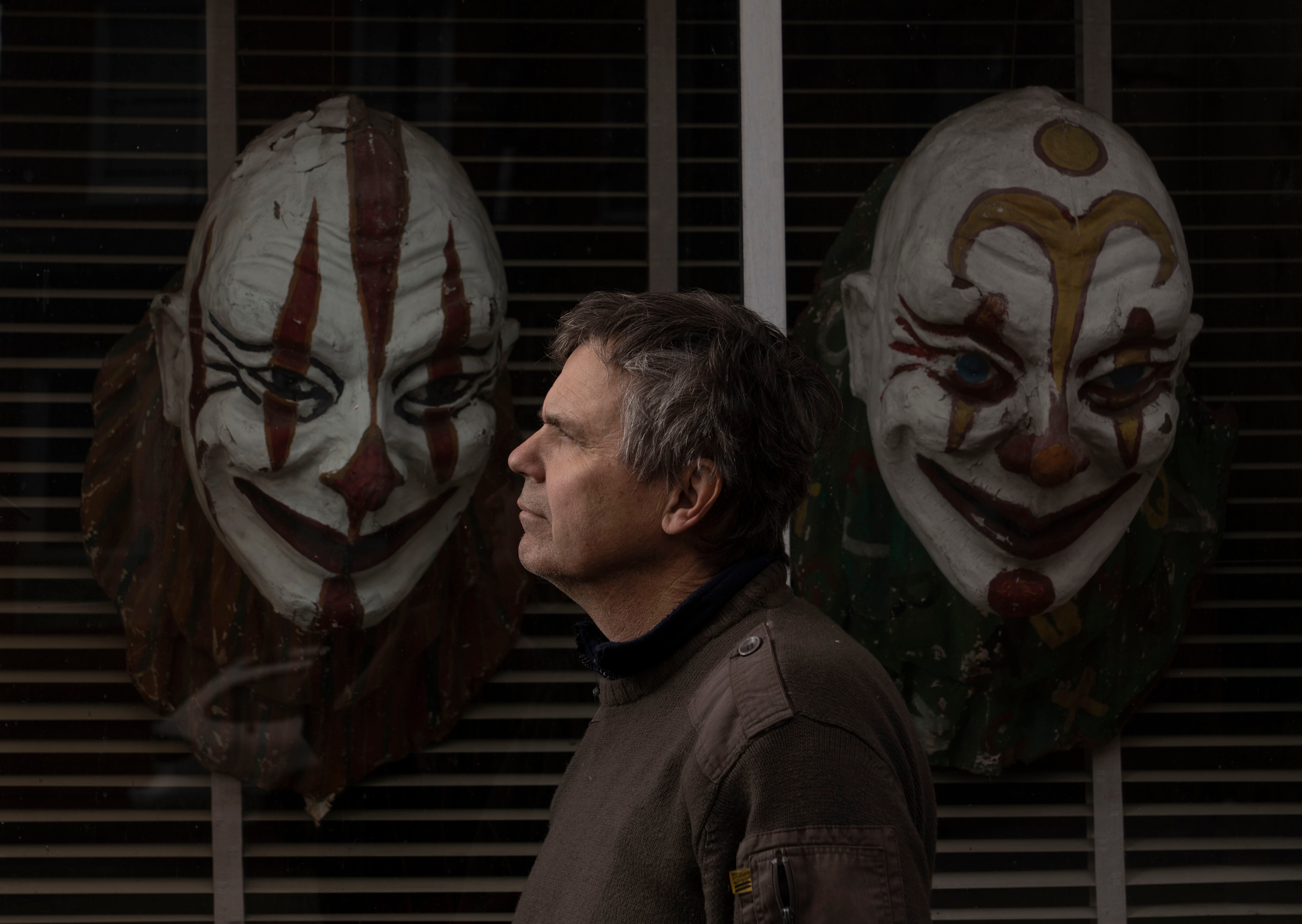 Rick Goebel, owner of A.T. Jones Costume company poses for a portrait outside of the store in Baltimore, Thursday, March 2, 2023.