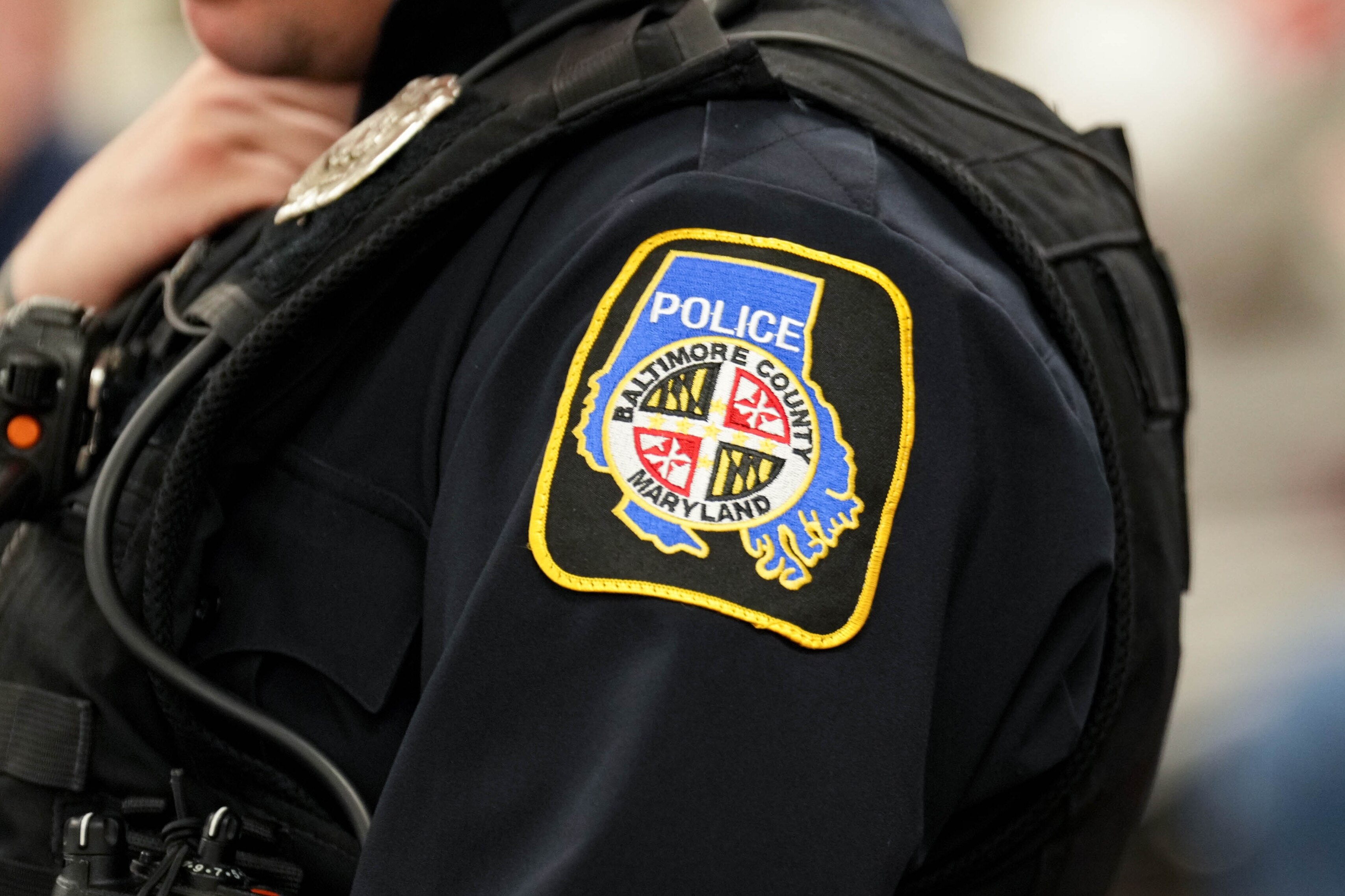 A Baltimore County Police officer’s uniform patch seen during a meeting of the White Marsh Police and Community Relations Council at the Perry Hall Family Worship Center in Perry Hall, Md., on Tuesday, March 10, 2026.
