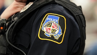 A Baltimore County Police officer’s uniform patch seen during a meeting of the White Marsh Police and Community Relations Council at the Perry Hall Family Worship Center in Perry Hall, Md., on Tuesday, March 10, 2026.