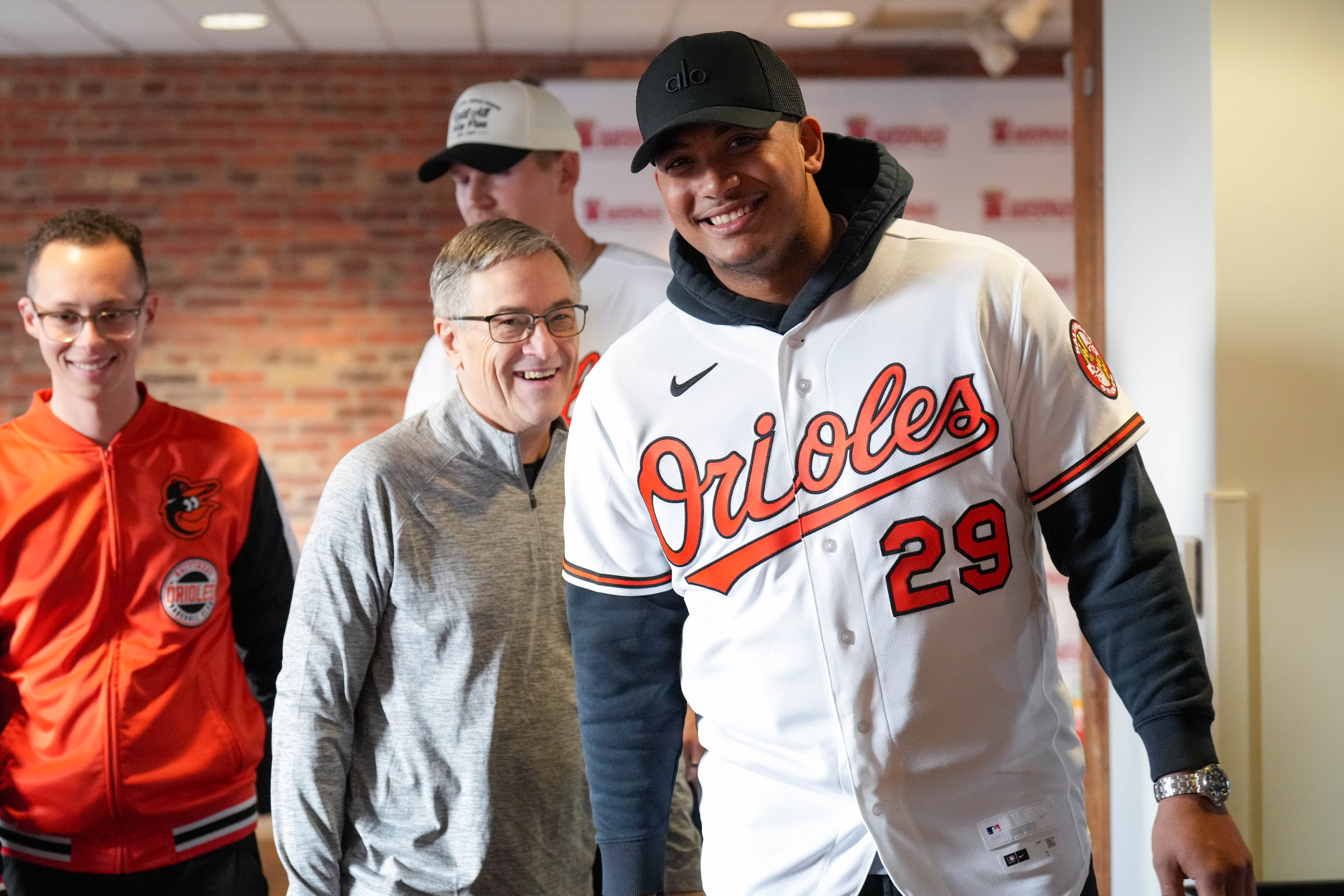 Orioles catcher Samuel Basallo, right, speaks with fans during a Birdland Caravan event in the warehouse at Oriole Park at Camden Yards last week.
