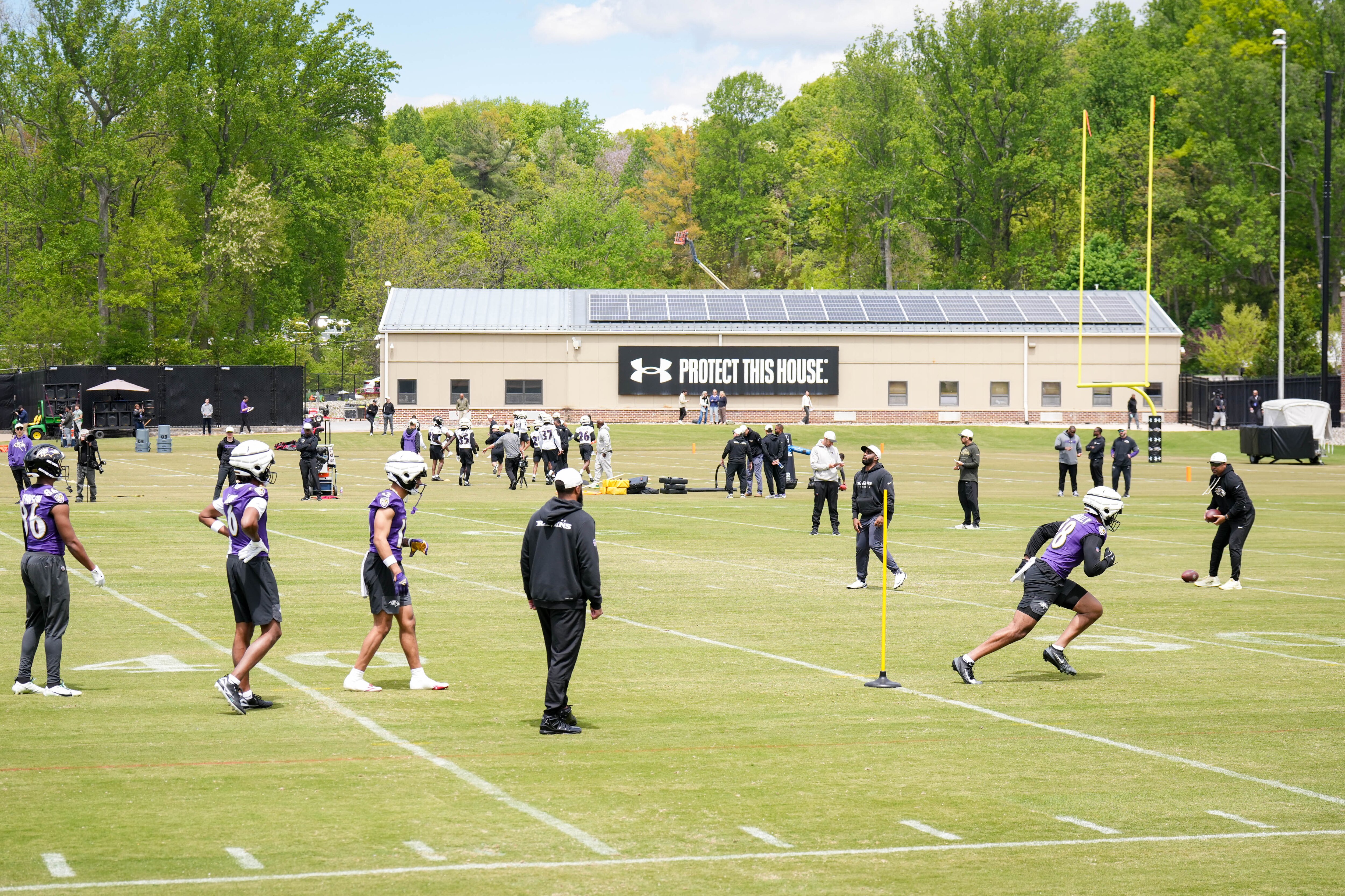 Baltimore Ravens rookies warm up during rookie minicamp practice at the Under Armour Performance Center in Owings Mills earlier this year.