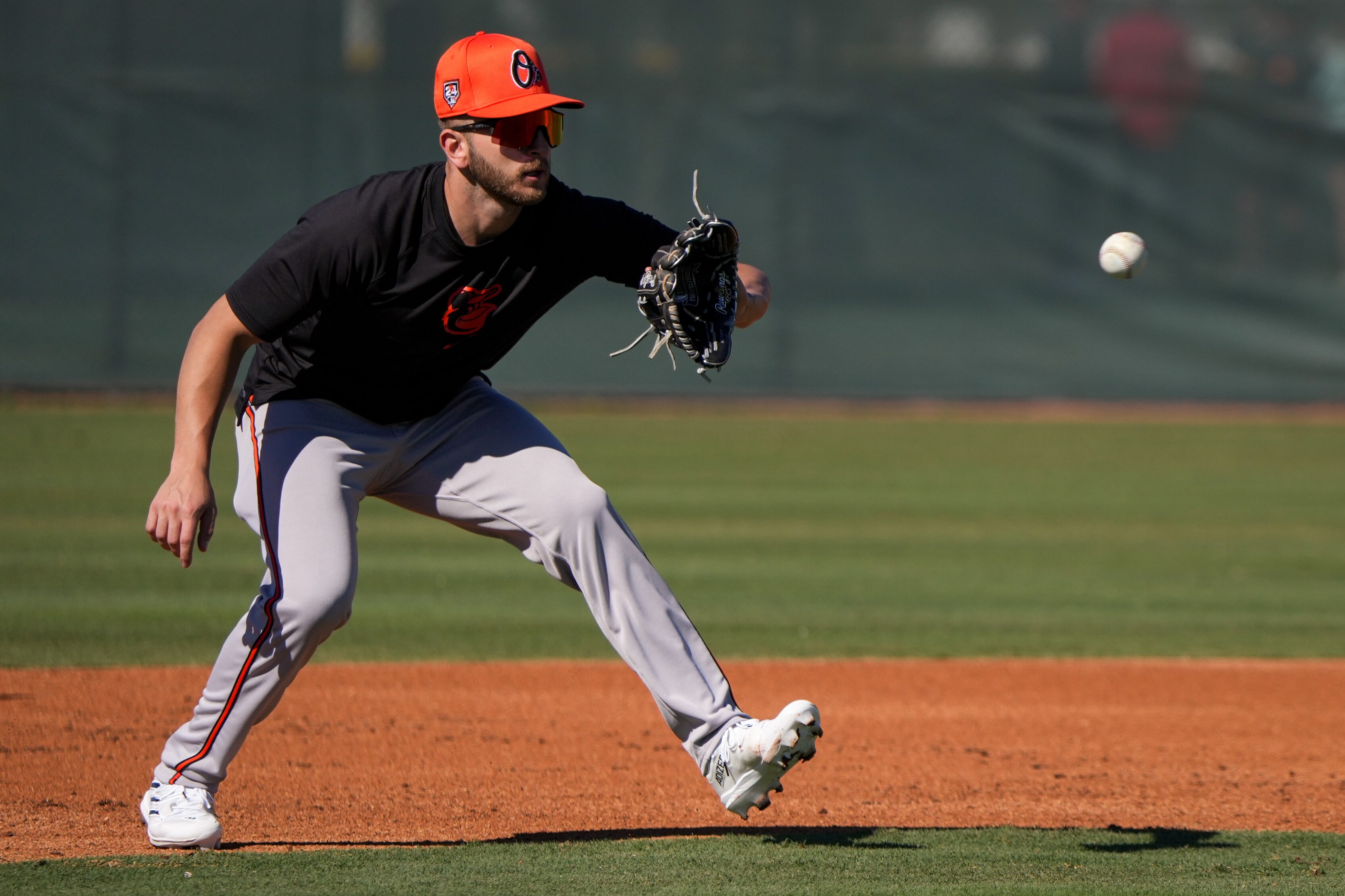 Baltimore Orioles infielder Connor Norby makes a catch during the team’s spring training session at Ed Smith Stadium on Feb. 22, 2024.