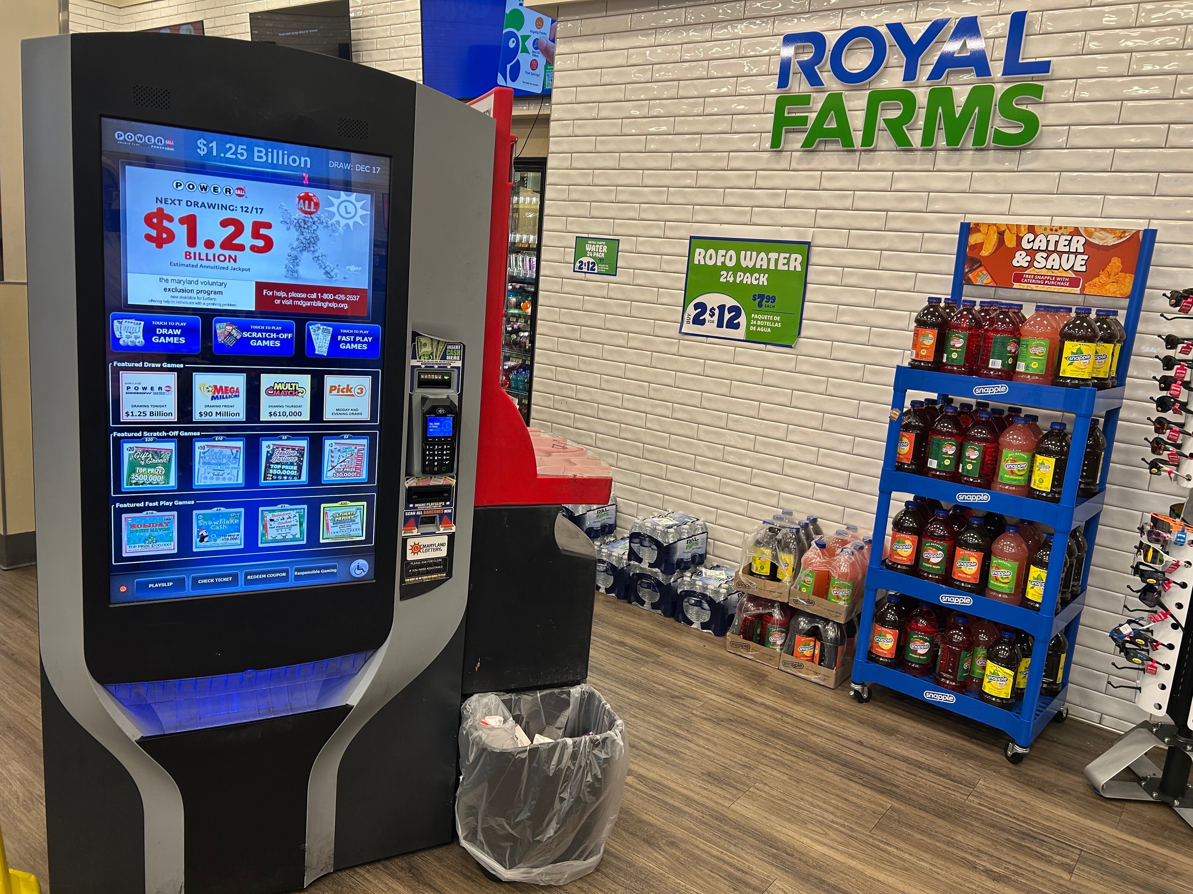 A self-automated lottery machine at a Royal Farms on Light Street in Baltimore displays the $1.25 billion jackpot for the drawing Wednesday, Dec. 17, 2025.