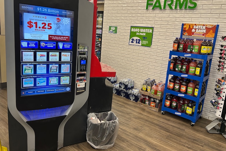 A self-automated lottery machine at a Royal Farms on Light Street in Baltimore displays the $1.25 billion jackpot for the drawing Wednesday, Dec. 17, 2025.