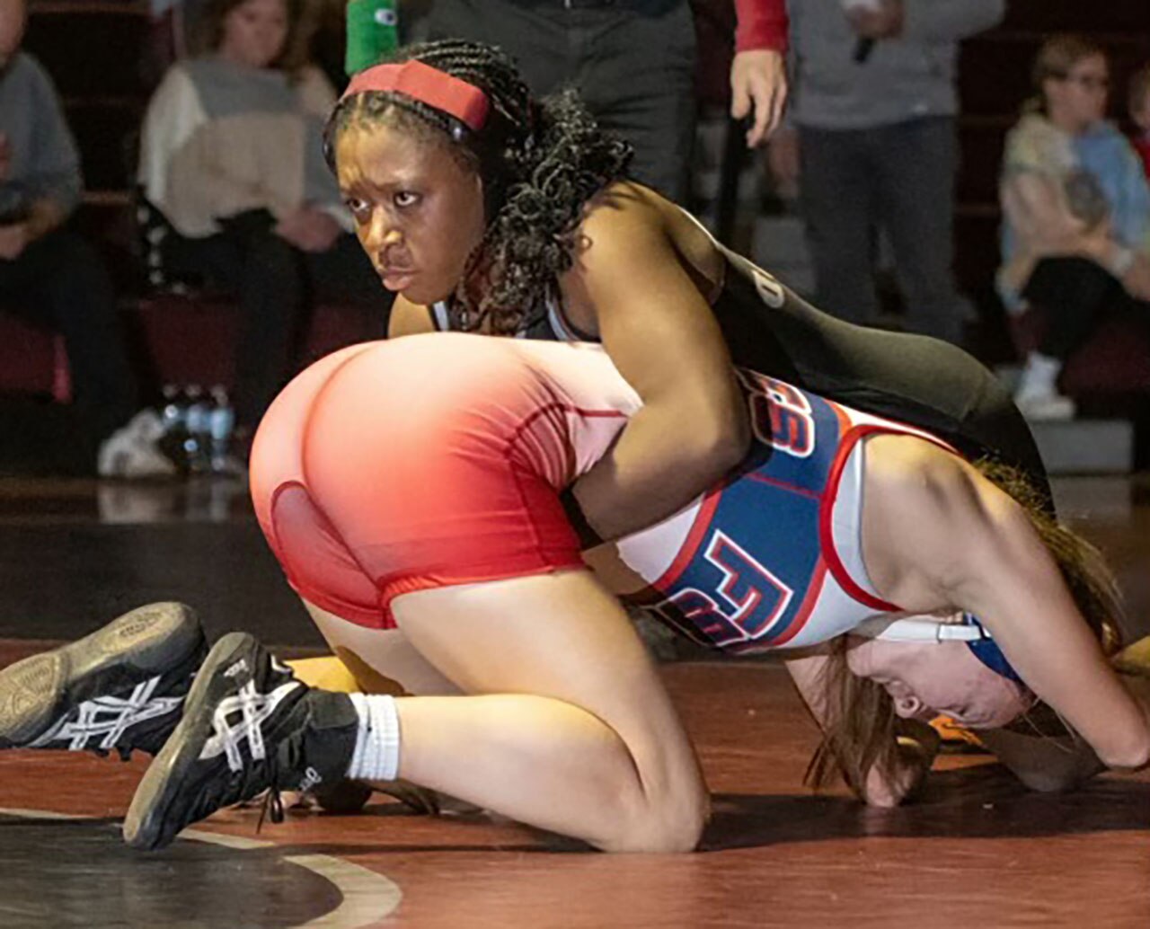 Winters Mill sophomore state runner-up Gabbie McLeod (top) has a record of 11-0 at 145 pounds that includes this third period pin over fellow regional champion junior Adeline Kraics (bottom). McLeod and Kraics could meet again at this weekend's all-girls state tournament which begins on Thursday at Show Place Arena in Upper Marlboro.
