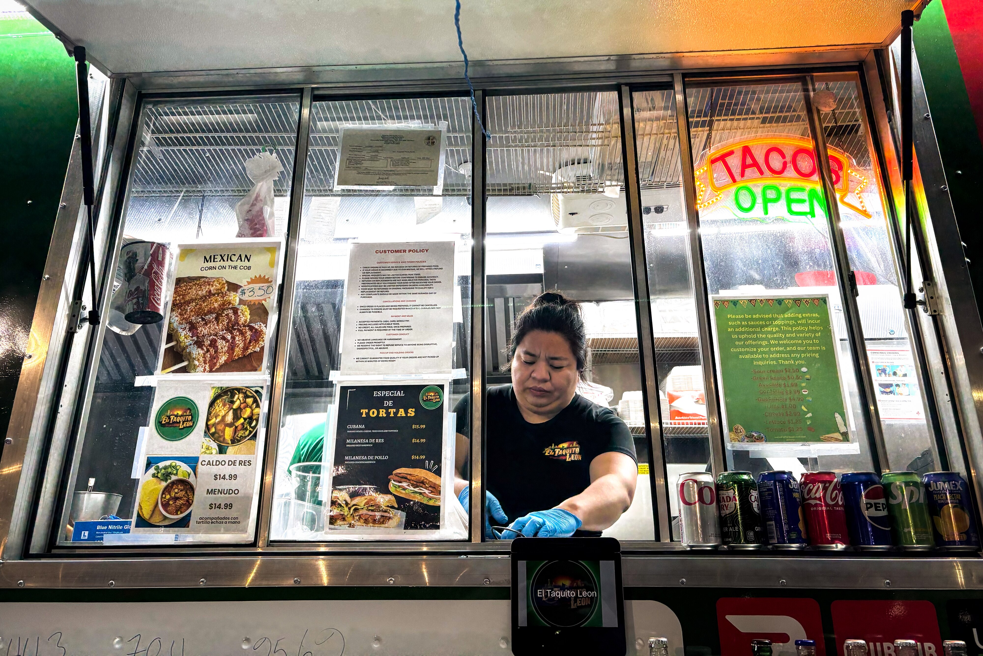 A server prepares an order at El Taquito Leon #1 in the Parkville area of Baltimore County. This food truck, with several locations in Baltimore and Harford Counties, is a fine alternative to Chipotle.