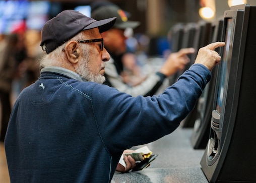 Al Ghadimi, 90, of Laurel, has been coming to the Laurel Park Race Track for around 40 years after a friend brought him to check it out one day. “I know all those ding-dongs” he says, referring to fellow gamblers at the track. He says about 90% of the time he loses, but on this particular bet he made a few dollars.