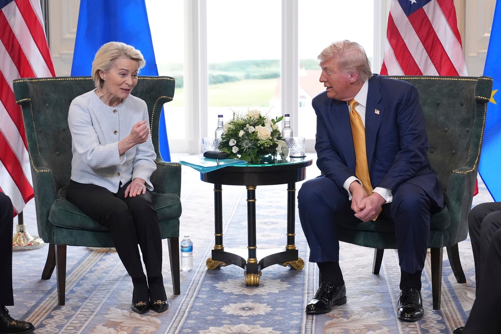 President Donald Trump and European Commission President Ursula von der Leyen speak as they meet at the Trump Turnberry golf course in Turnberry, Scotland.
