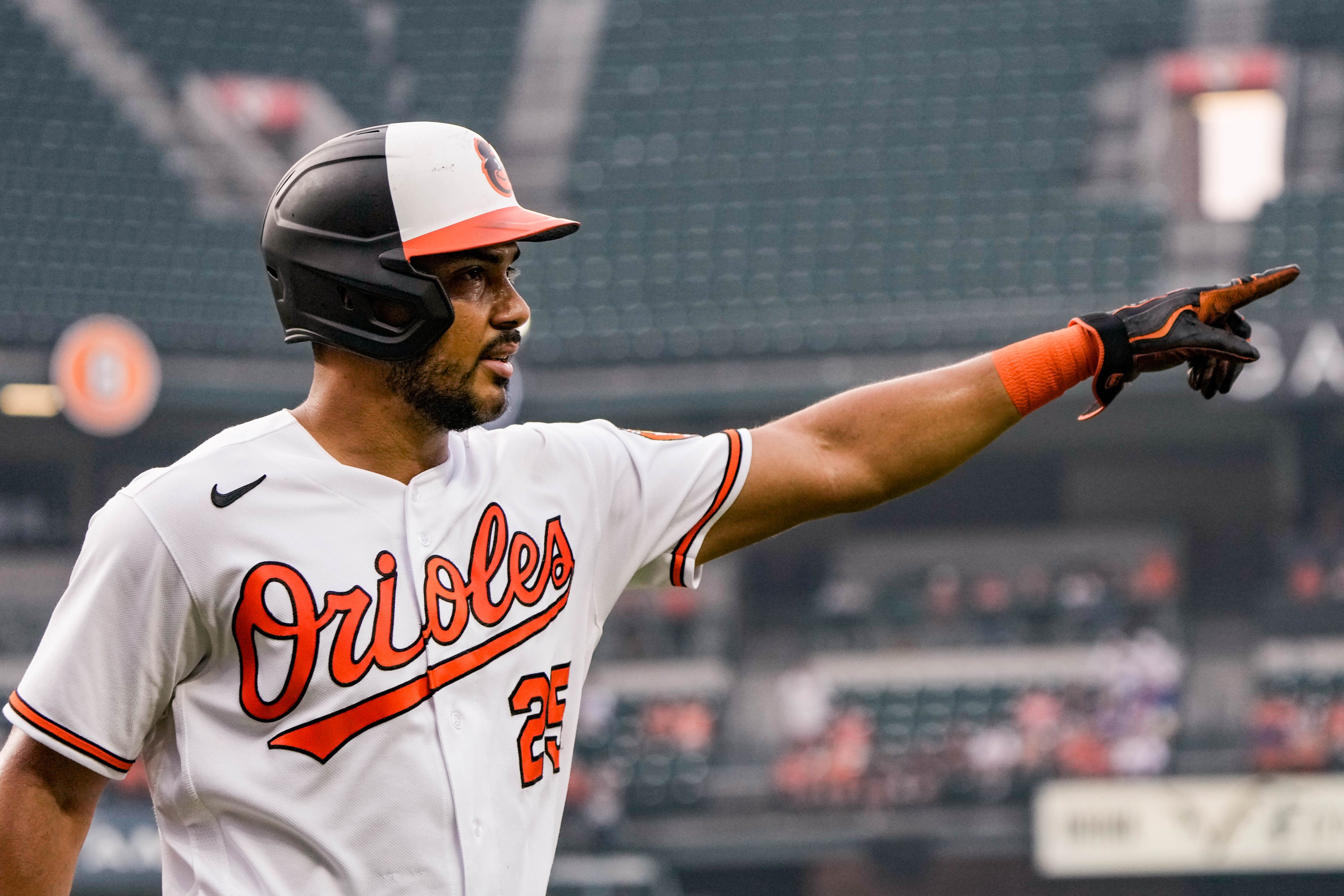 Orioles designated hitter Anthony Santander points to the crowd after scoring the first run of the first game of the series against the Dodgers on July 17, 2023 at Camden Yards.