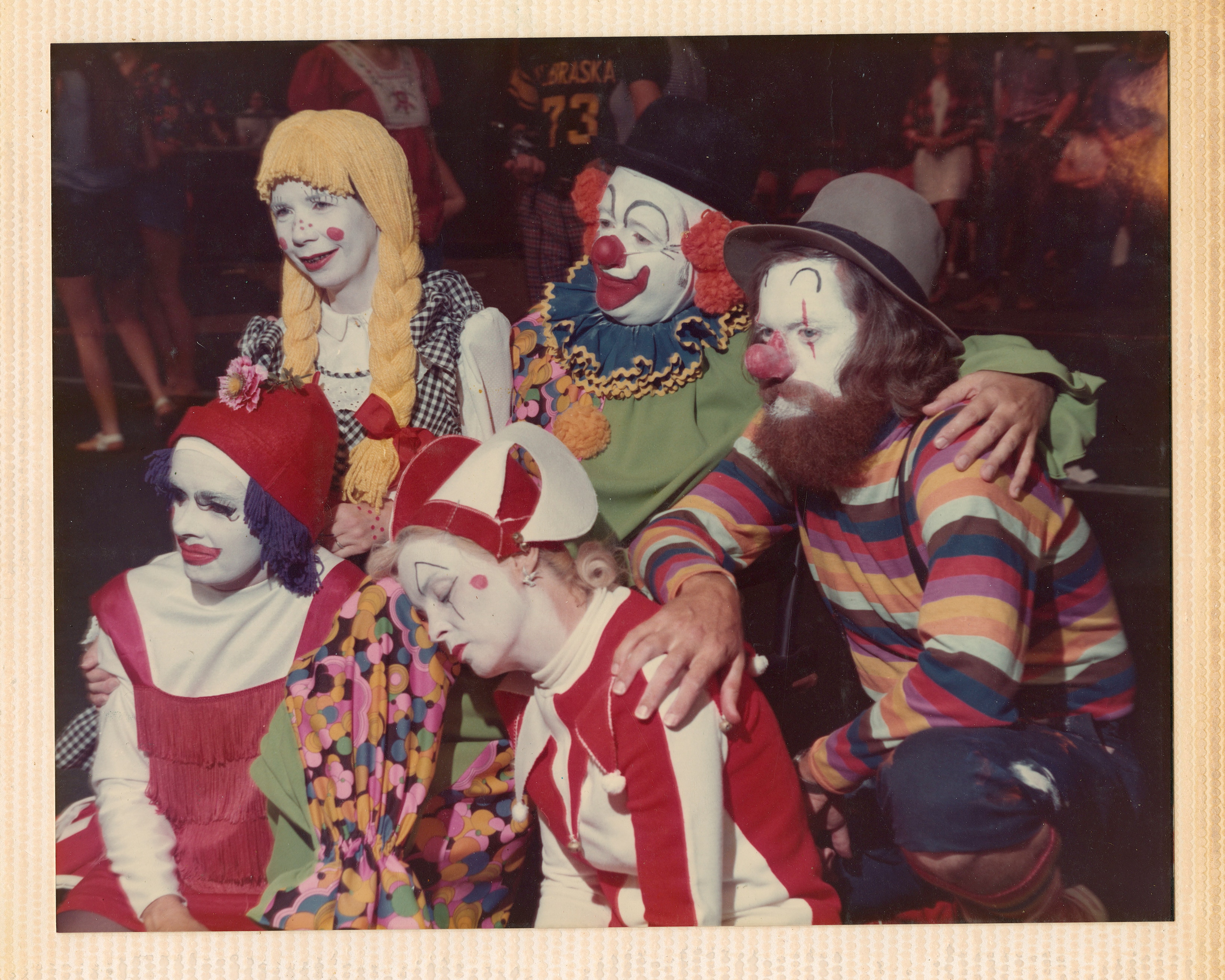 1973. A scrapbook that showcases Faith and Fantasy. The 3 sections of the scrapbook include clown classing and clowning in general, a Houston, Texas Lutheran youth gathering in the Astrodome, and a clown workshop at Princeton Seminary. Clippings, photographs, programs, newsletters, playscripts, postcards, publications, handwritten letters, drawings, correspondence, napkin, plastic flower, and receipt.
