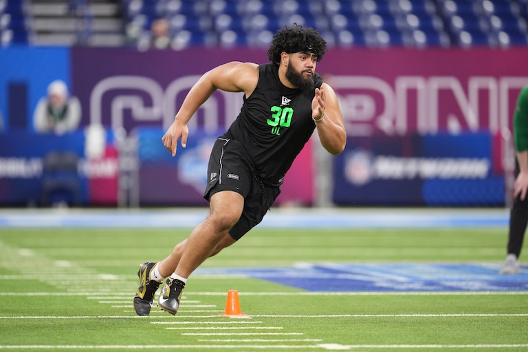Penn State offensive lineman Olaivavega Ioane (30) runs a drill at the NFL football scouting combine in Indianapolis, Sunday, March 1, 2026.