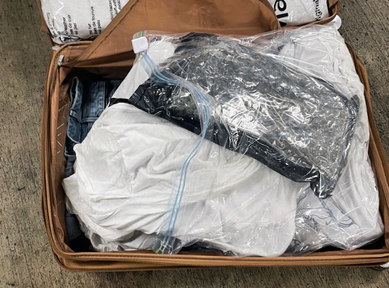 Two Baltimore residents were arrested at Washington Dulles International Airport after U.S. Customs and Border Protection officers on April 16, 2026, intercepted more than 50 pounds of marijuana in checked luggage bound for a London flight.