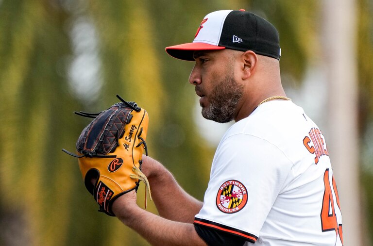 Baltimore Orioles starting pitcher Albert Suárez (49) prepares to pitch during a Grapefruit League game against the Pittsburgh Pirates at Ed Smith Stadium in Sarasota, Fla. on Saturday, February 22, 2025.