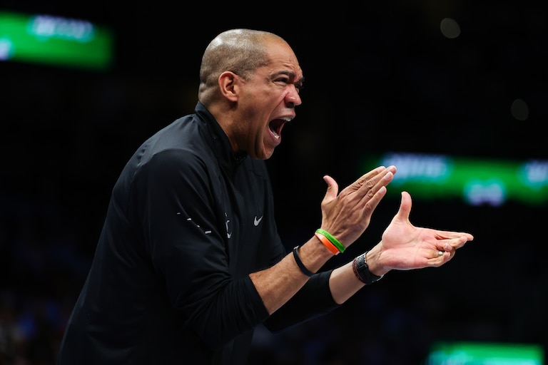 Washington Mystics head coach Sydney Johnson reacts during the first half in Game 1 of an WNBA basketball first-round playoff series against the Atlanta Dream, Sunday, Sept. 27, 2026, in Atlanta. (AP Photo/Colin Hubbard)