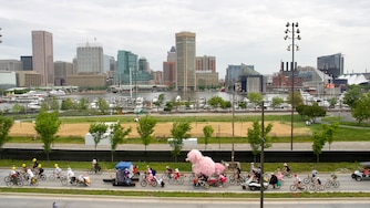 FiFi the Poodle, the race’s most heavy sculpture, makes her way down Key Highway to kick off the Kinetic Sculpture Race in Baltimore on Saturday, May 3, 2025.