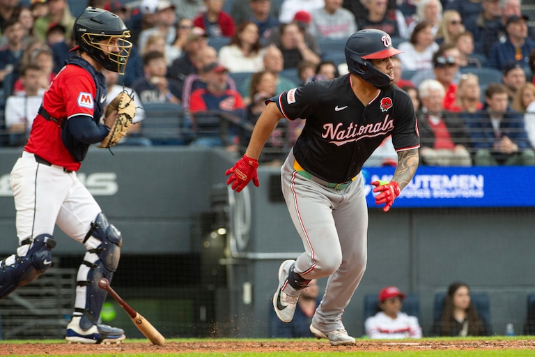 Washington Nationals' Luis Garcia Jr., right, watches his two-run single off Cleveland Guardians relief pitcher Logan Allen as catcher Patrick Bailey look on during the sixth inning of a baseball game, Monday, May 25, 2026, in Cleveland.