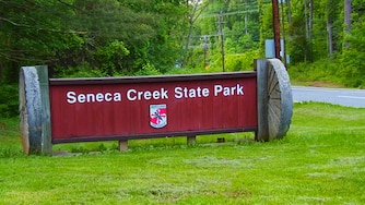 A sign welcomes visitors to Seneca Creek State Park in Montgomery County, Maryland.