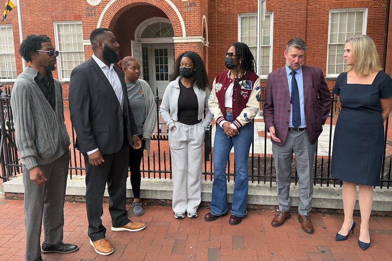 WEDNESDAY, SEPTEMBER 23, 2026 - Charles Blackeney, second from left, is the older brother of Britrain Gray, a 23-year-old who was murdered in 2022 while working at a McDonald's. Backeney served as a family spokesperson, and is standing with some of his siblings and Anne Arundel County State's Attorney Anne Colt Leitess, right, and assistant state's attorney Glen Neubauer, second from right.