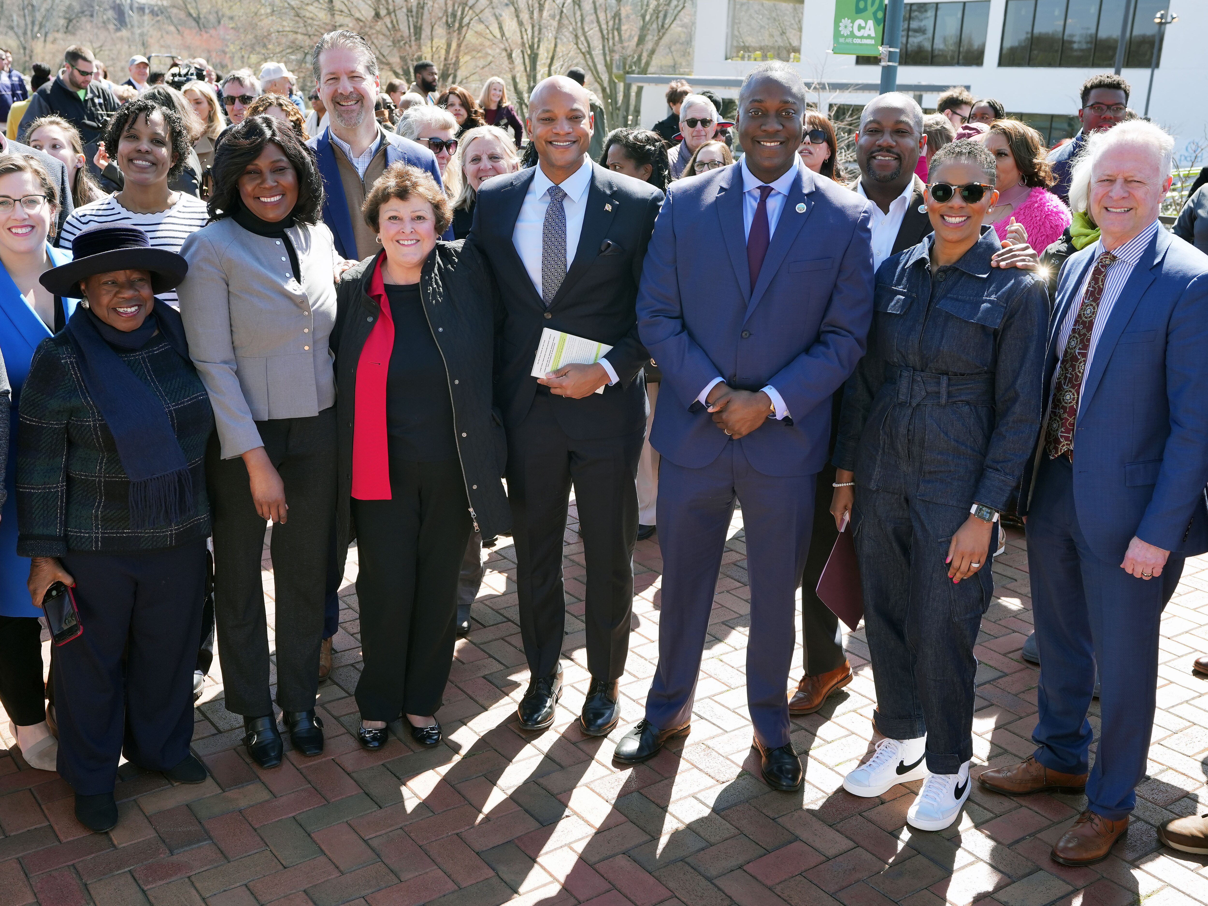 The Governor, County Executive, and others take a photo after announcing a new Library will be built on the Columbia Waterfront, in Columbia, MD., on March 30, 2023.