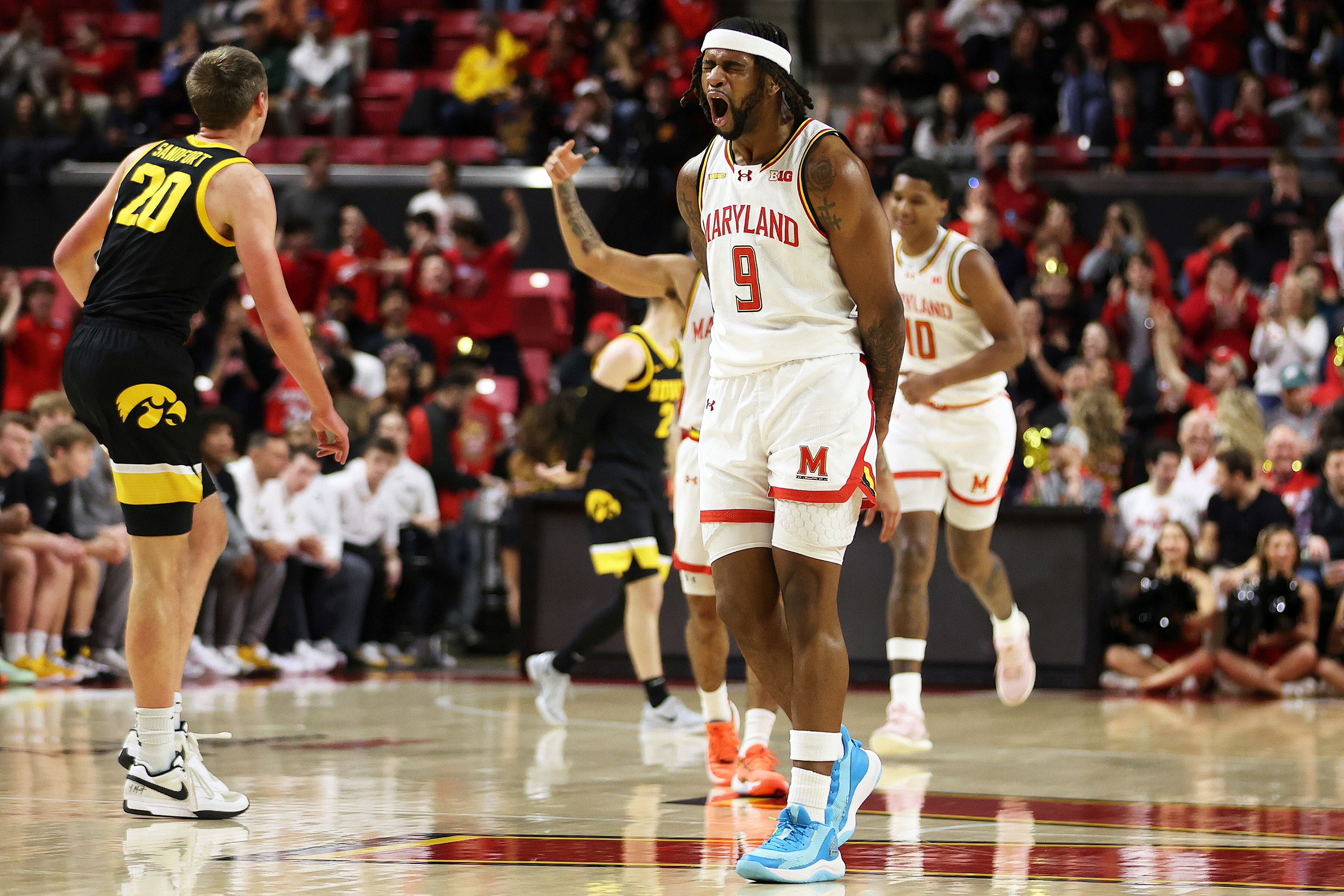 Maryland guard Selton Miguel (9) celebrates during the first half of an NCAA college basketball game against Iowa, Sunday, Feb. 16, 2025, in College Park, Md. (AP Photo/Daniel Kucin Jr.)