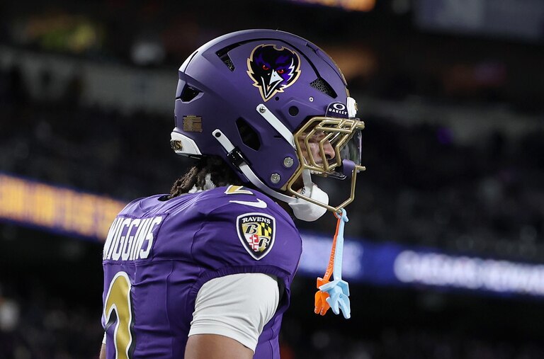 BALTIMORE, MARYLAND - NOVEMBER 27: Nate Wiggins #2 of the Baltimore Ravens speaks with Ja'Marr Chase #1 of the Cincinnati Bengals after an incompletion during the second quarter in the game at M&T Bank Stadium on November 27, 2025 in Baltimore, Maryland.
